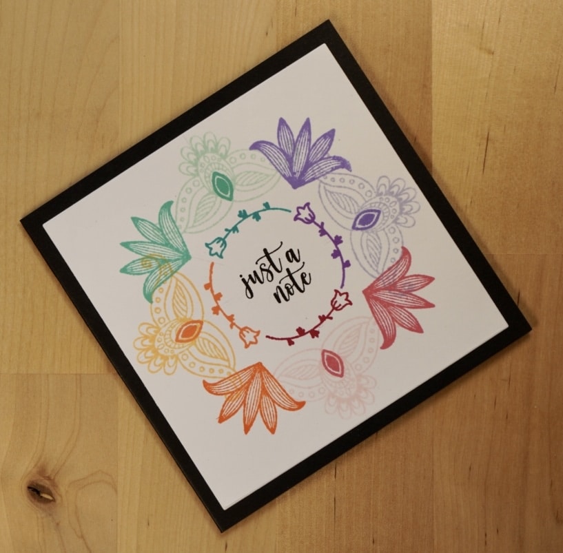 Beautiful Just a Note card stamped in a rainbow mandala wreath.