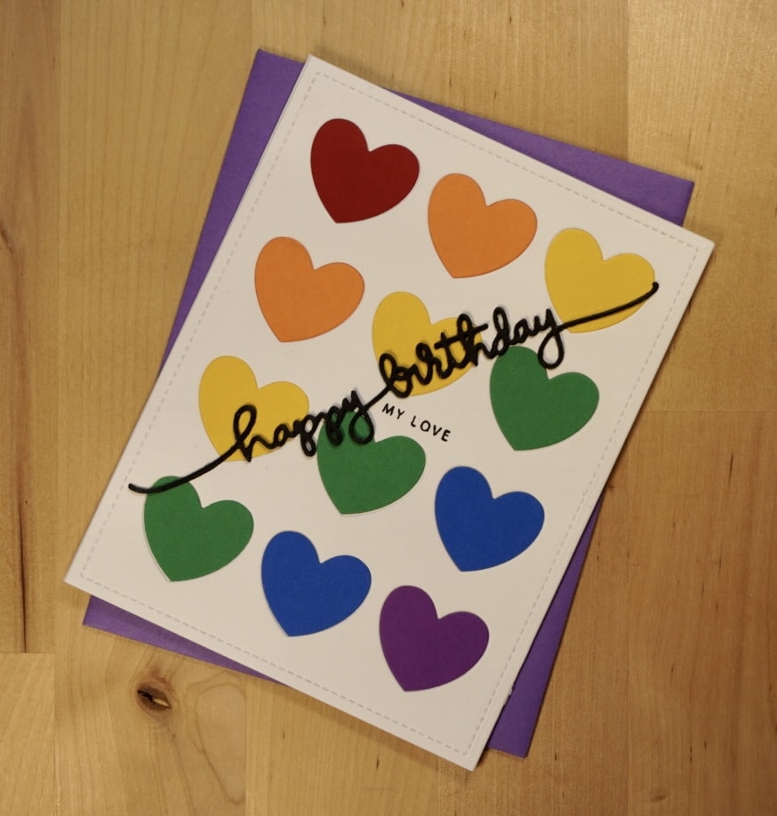 Clean and simple handmade heart rainbow birthday card.