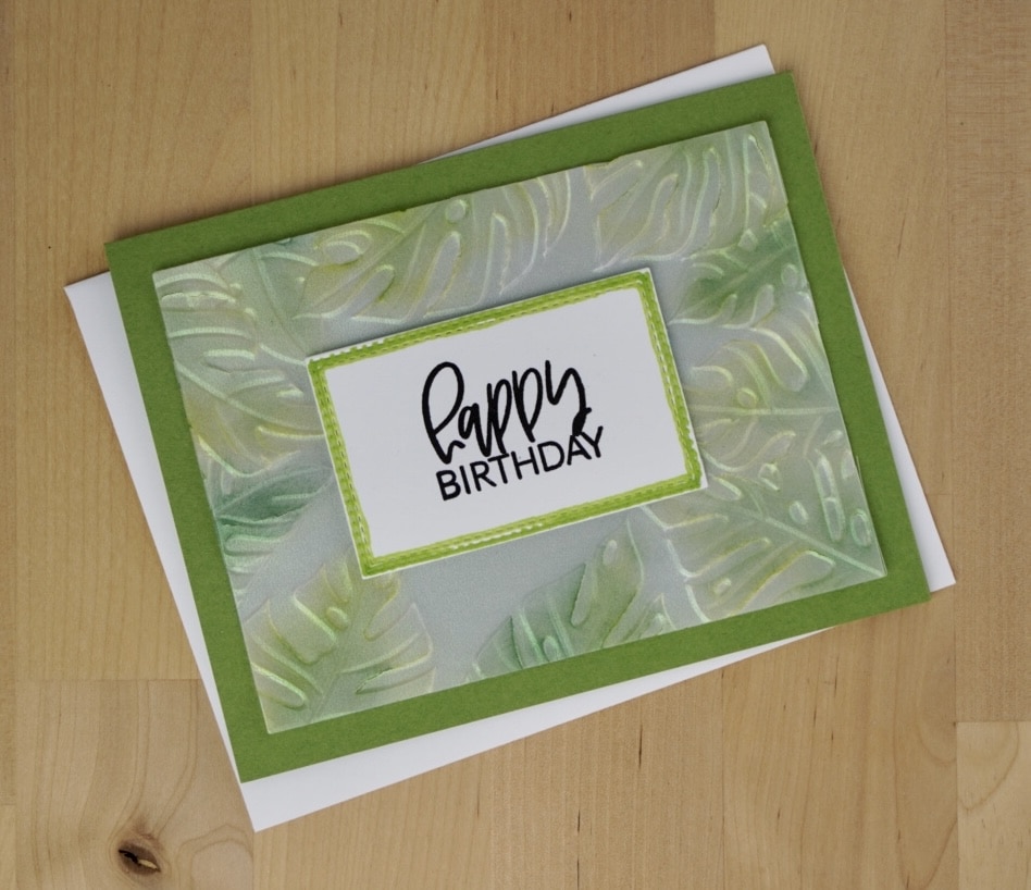 One of two masculine cards using embossing folders and pearlescent vellum to produce a beautiful background.