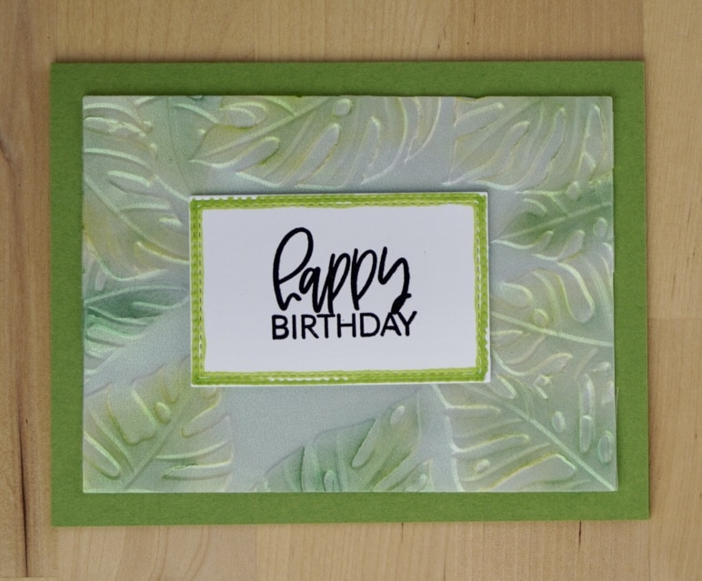 One of two masculine cards using embossing folders and pearlescent vellum to produce a beautiful background.