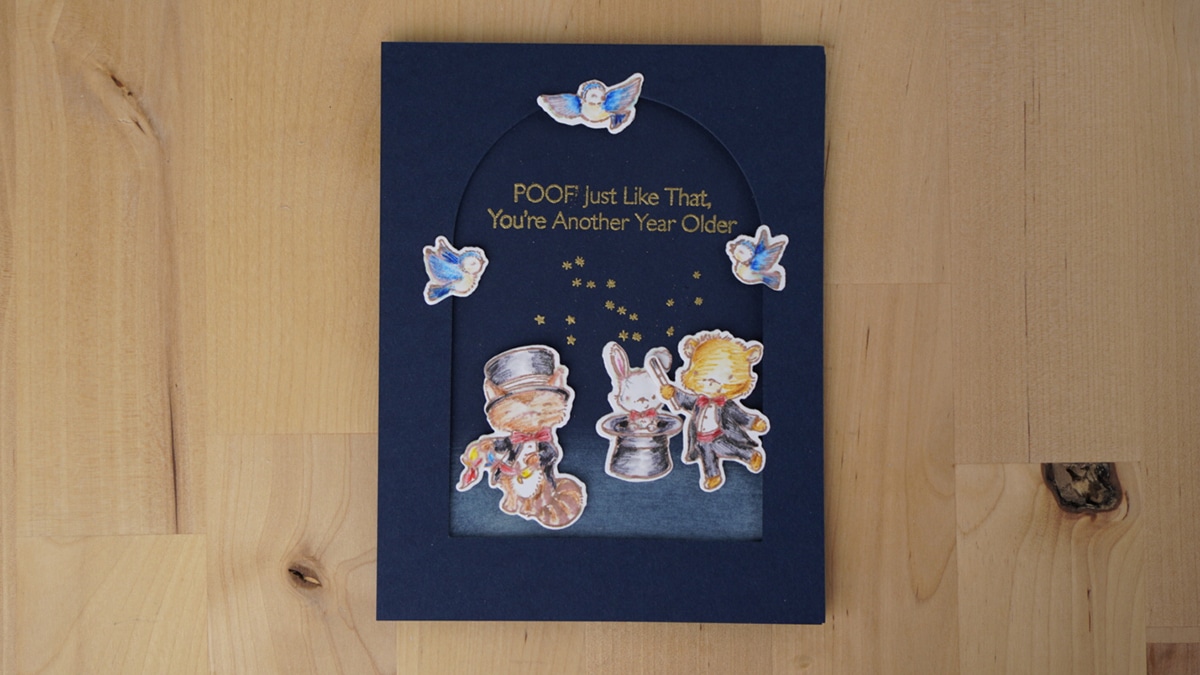 Darling magical card with cute colored critters.