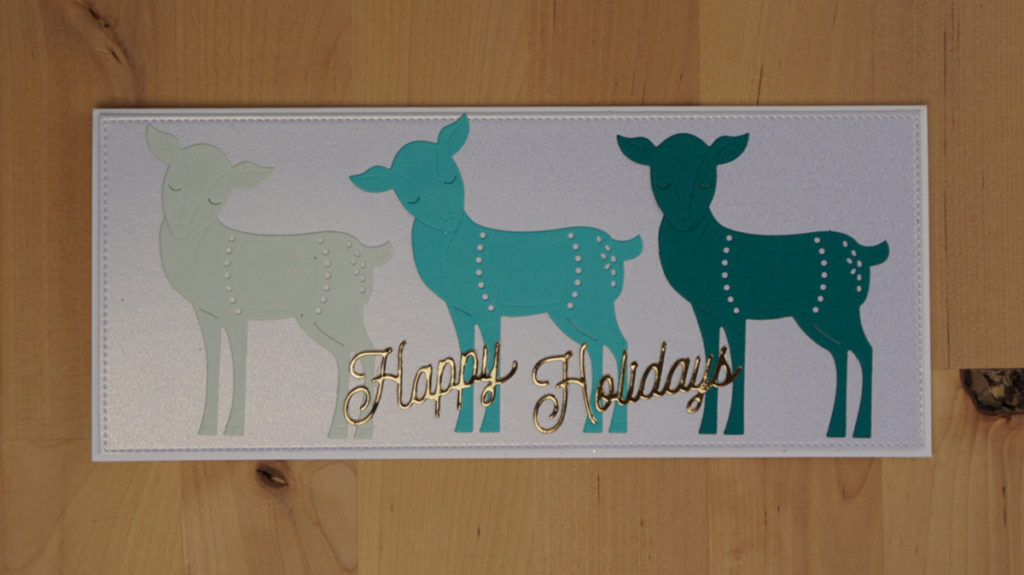 Beautiful monotone teal holiday card made with Nordic Spellbinders Magical Deer and Classic Happy Holidays die sets.