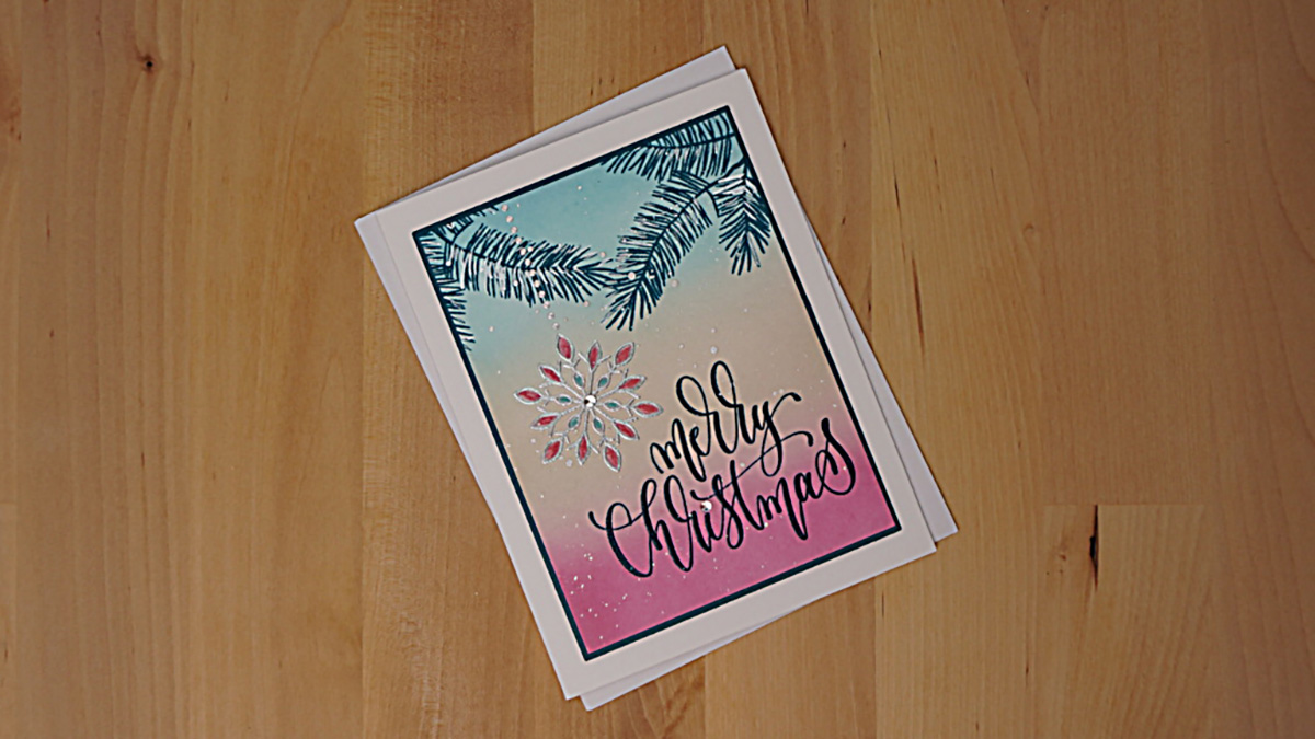 Rainbow and silhouettes are features of the card for Day 11 of the 25 Days of Christmas Cards.