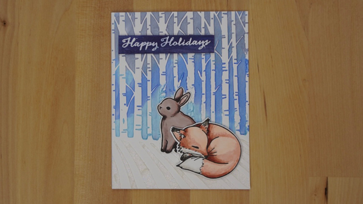 The Silent Night card for Day 8 has two cute little creatures in a winter wonderland created with multi-media.
