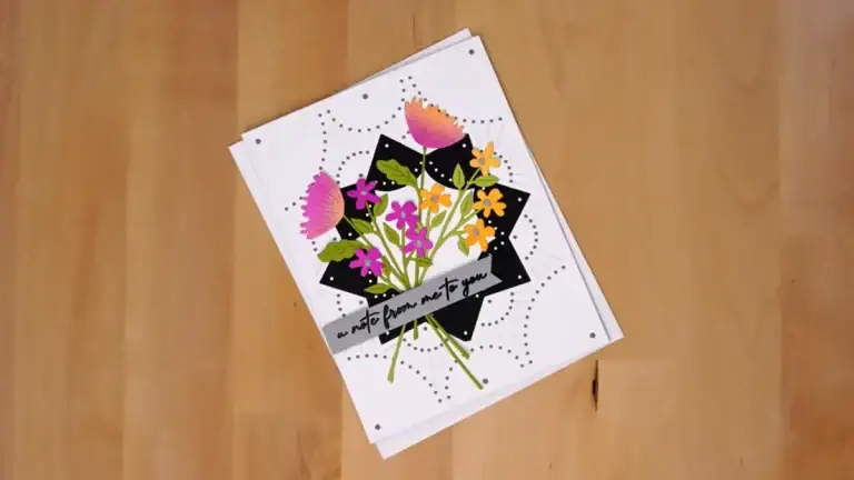 Pretty floral card using stitched cover die set for the background.
