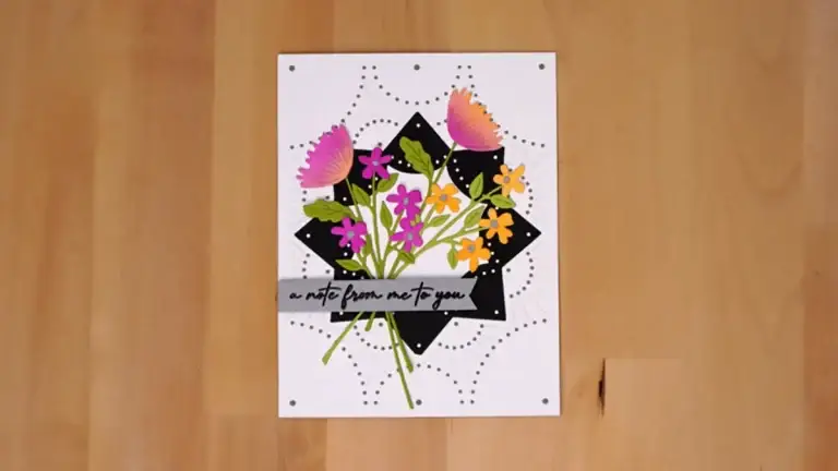 Pretty floral card using stitched cover die set for the background.