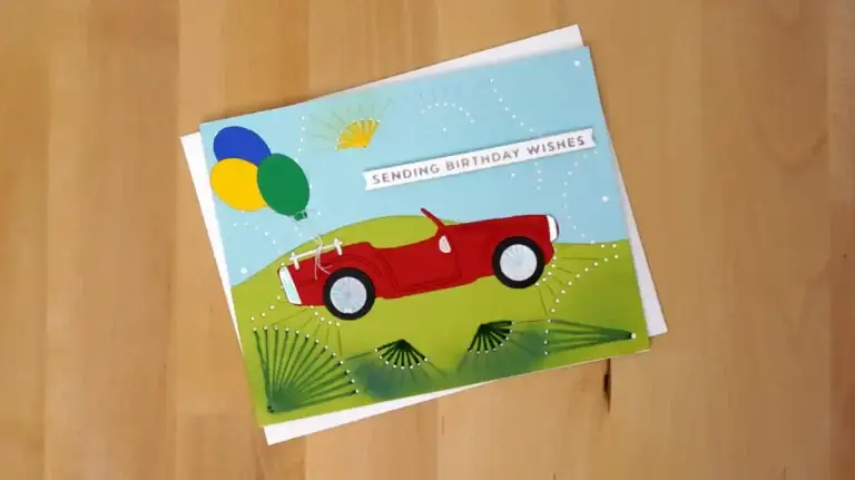 Birthday card with Bright red car and ballons