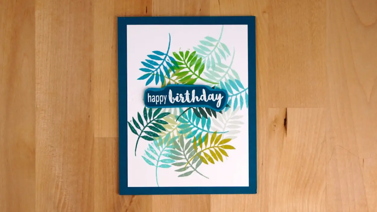 Fun card created for the Altenew Educators' Instagram Reel Hop, A Leafy Affair. The background is created using just one stamp with many cool colors of ink.