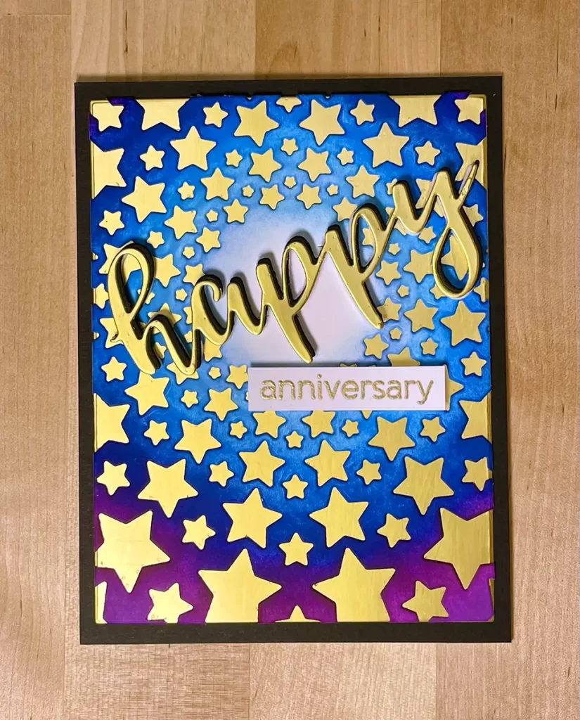 Fantastic masculine card for anniversaries.  Beautiful ink blended in blues and violets, and then die-cut background over gold mirror cardstock.  And a sentiments that read ;  Happy Anniversary.