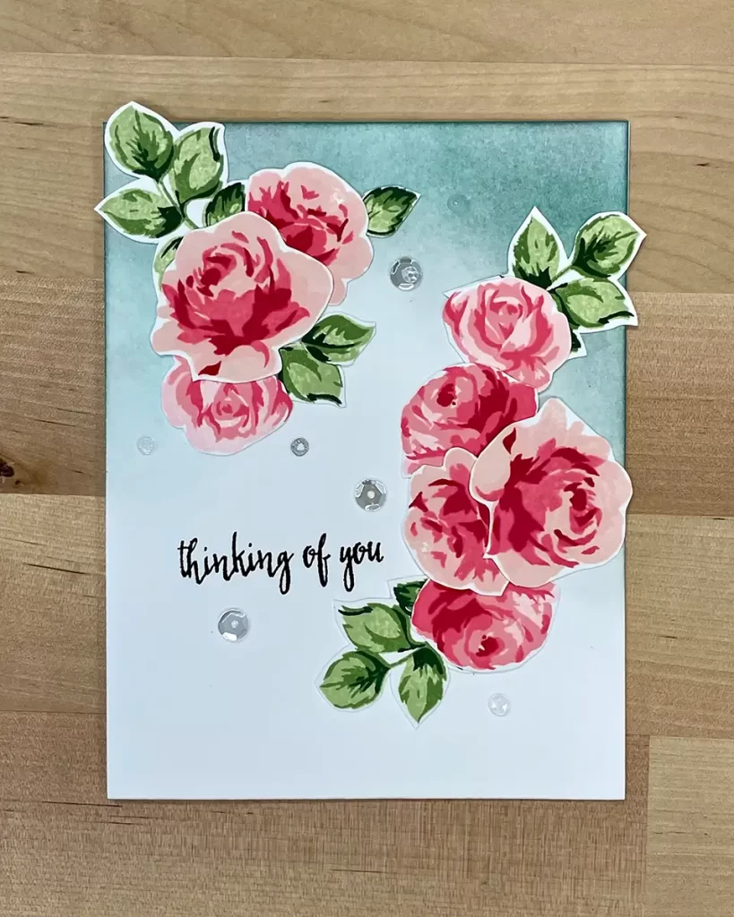 Pretty traditional card using layered stencils for focal points and ink blending techniques for the background