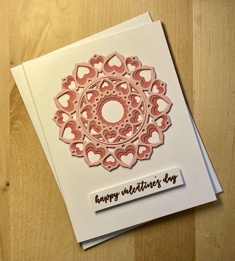 Beautiful clean and simple valentine with a layered die cut design.