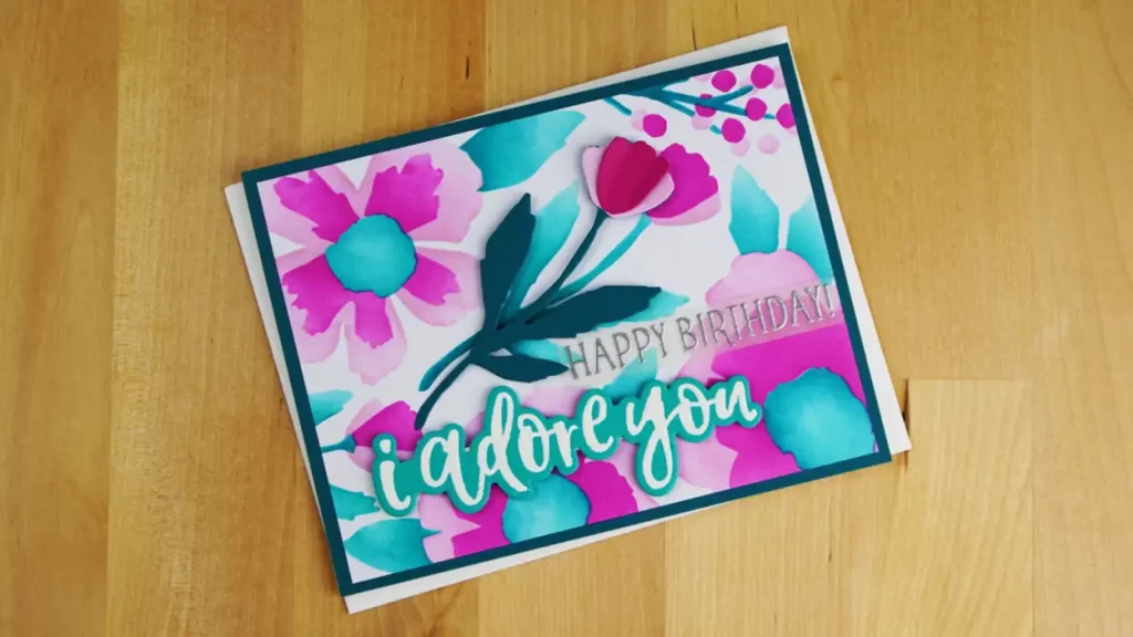 We explore the possibilities of stencils while making this beautiful birthday Card with added detailing from die-cuts.