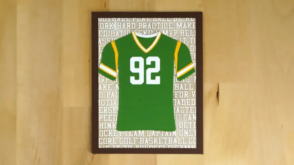 Great sports greeting card created using dies and embossing folder from Spellbinders September 2023 release in Green Bay Packers colors.