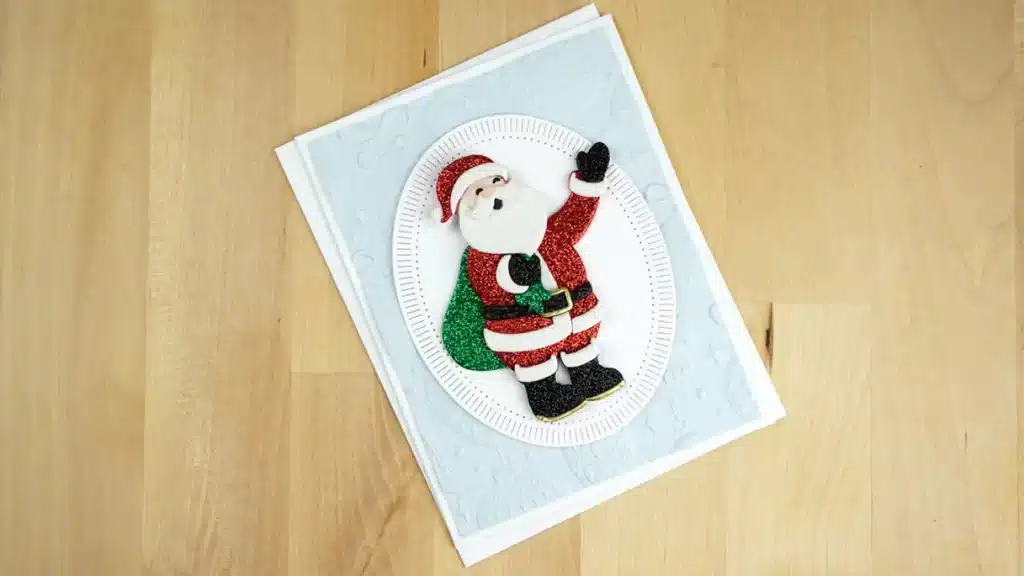 Glitter makes this Darling Christmas card created using Here's Santa Die.