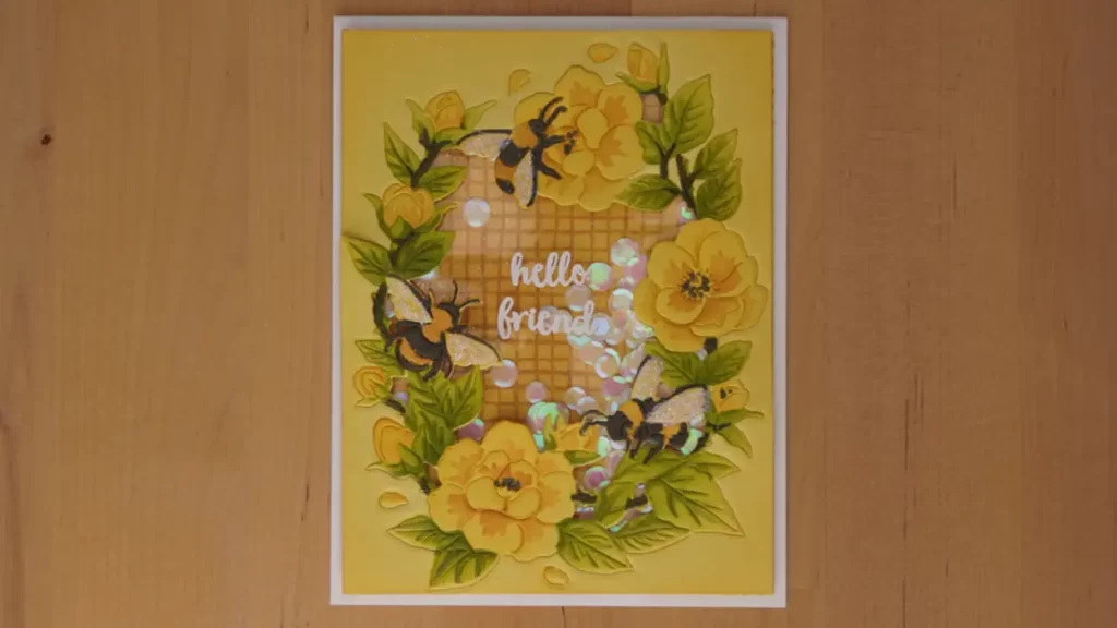 Lovely Bee shaker card created using dies, stencils, and rubber stamps.