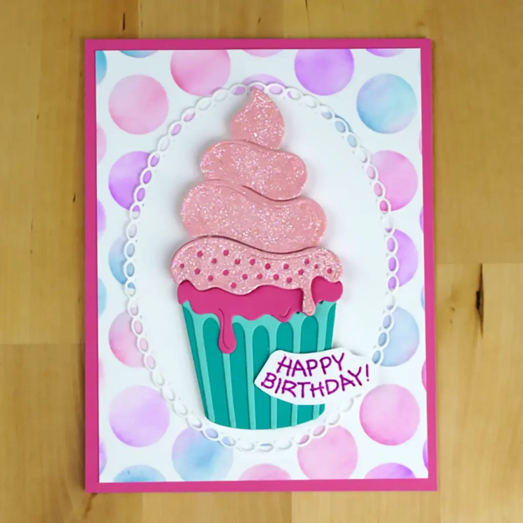Birthday card featuring a cupcake with purple icing created using Spellbinders Large Die of the Month.