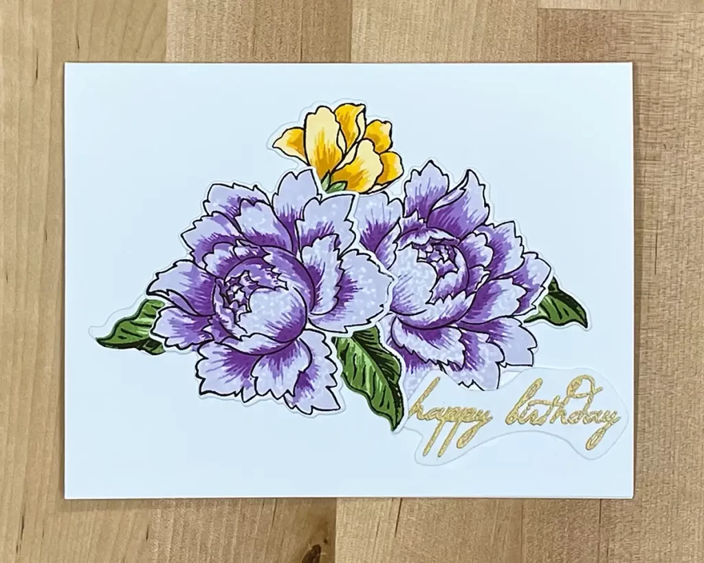 Beautiful birthday card with floral focal images created with layered stamping.