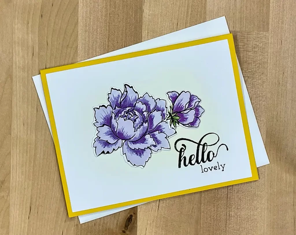 Beautiful birthday card with floral focal images created with layered stamping.