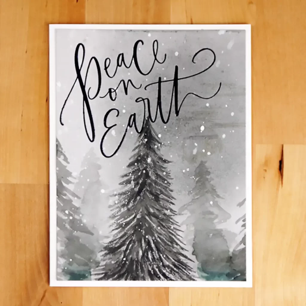 Card 5 of 6 BetterPress Christmas Cards is a striking winter scene with hand painted trees and falling snow.