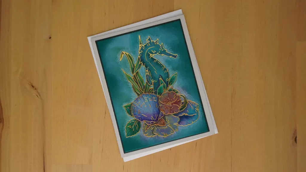 This beautiful card was created with a hot foil plate from the new Spellbinders Seahorse Kisses collection and colored with colored pencils.