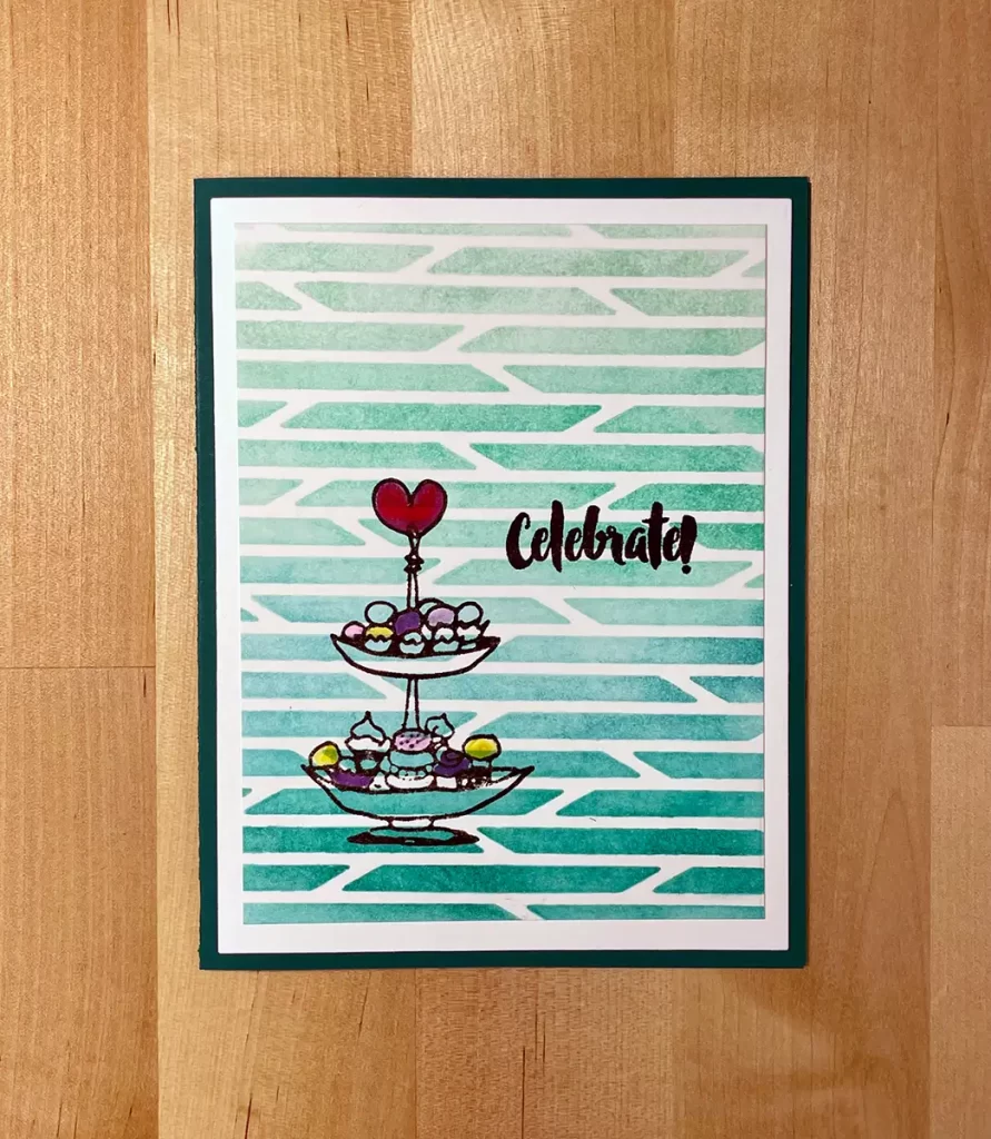 Card for a celebration with a  pretty background created with a cardmaking stencil.