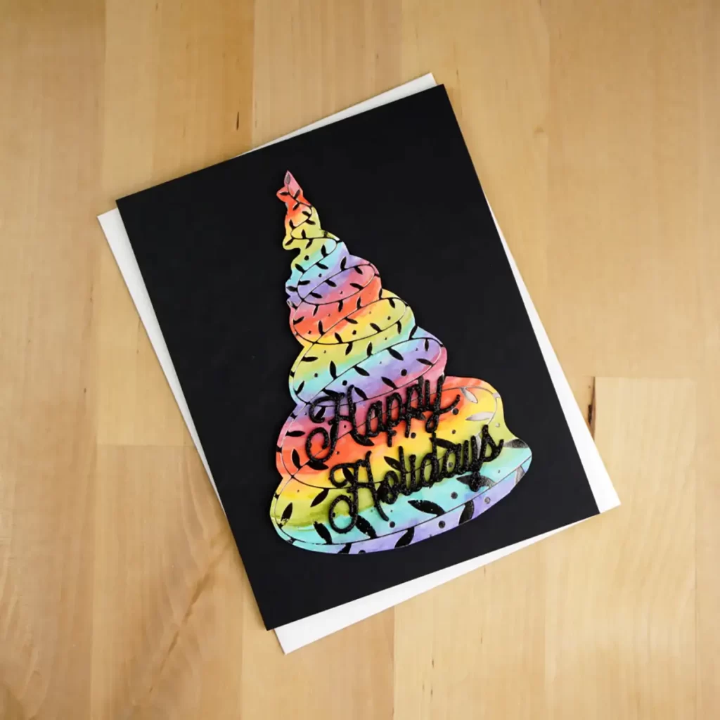 Who doesn't love a rainbow?  Well what about on a Christmas tree?  That is how this Christmas card is colored.