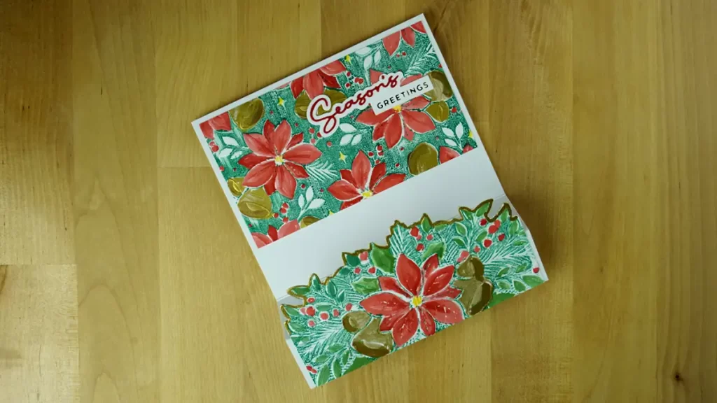 When you open the Christmas card featuring Poinsettia Bells and Borders there is a place to write a special message.