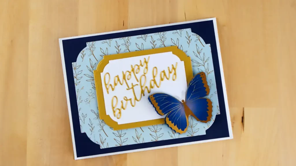 Clean and simple butterfly birthday card using three products from Spellbinders Serenade of Autumn Collection.