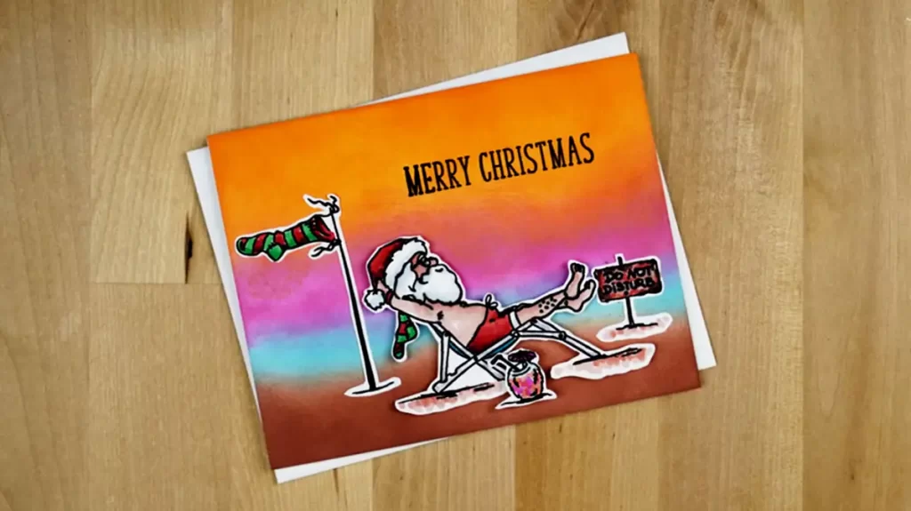 A festive Christmas card featuring Santa Claus sitting on a chair.