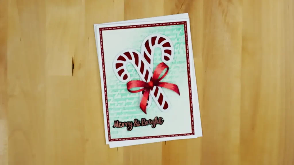 A Christmas card with a candy cane, counting down to Christmas on it.