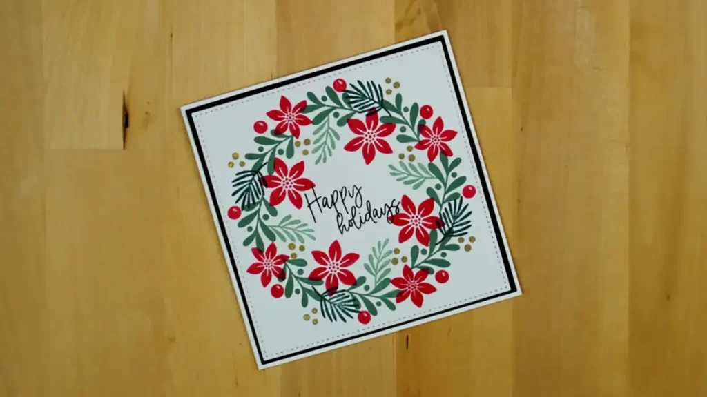 A festive card featuring a poinsettia wreath, perfect for the Countdown to Christmas.