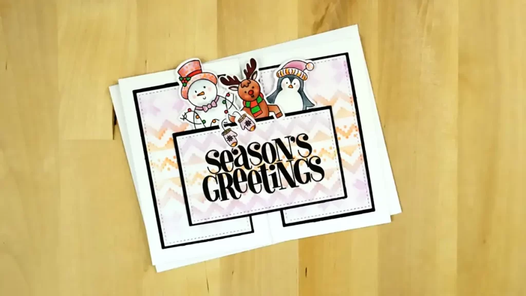 A festive card with the words "season's greetings" and a countdown to Christmas on it.