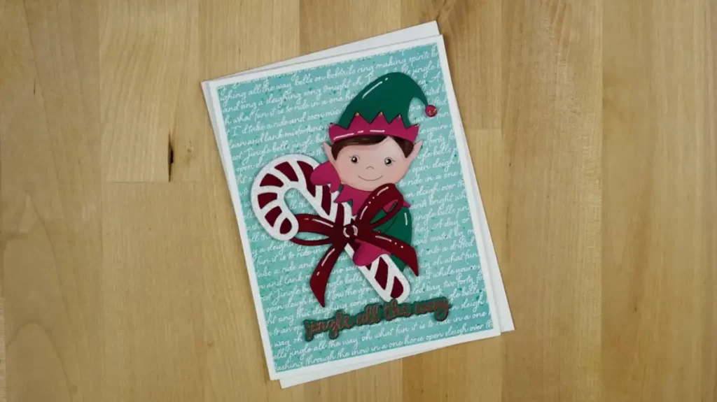 A card with an elf holding a candy cane, counting down to Christmas.