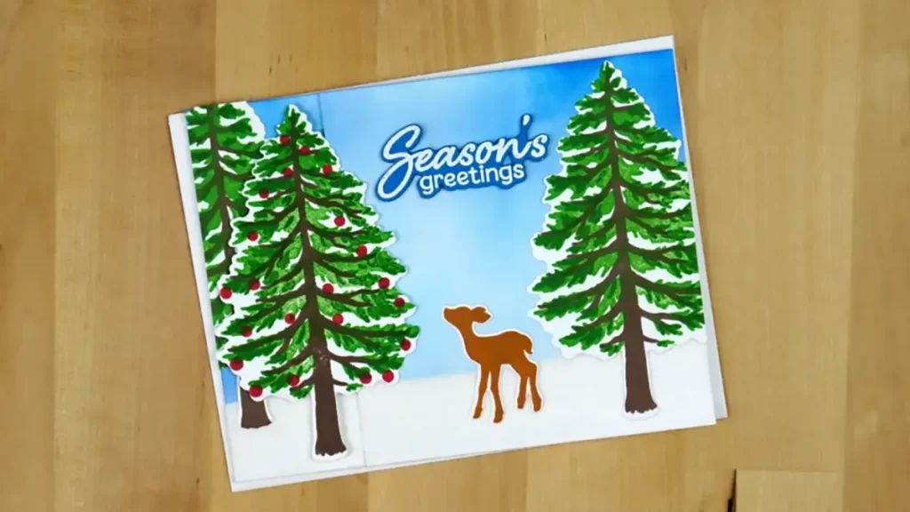 A festive greeting card featuring a deer amidst a winter forest, bringing cheer and marking the countdown to Christmas.