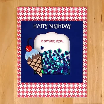A birthday shaker card with an ice cream cone on it.