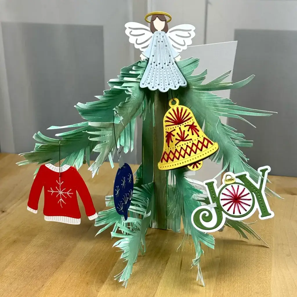 A christmas tree card 
with angels and ornaments on it.