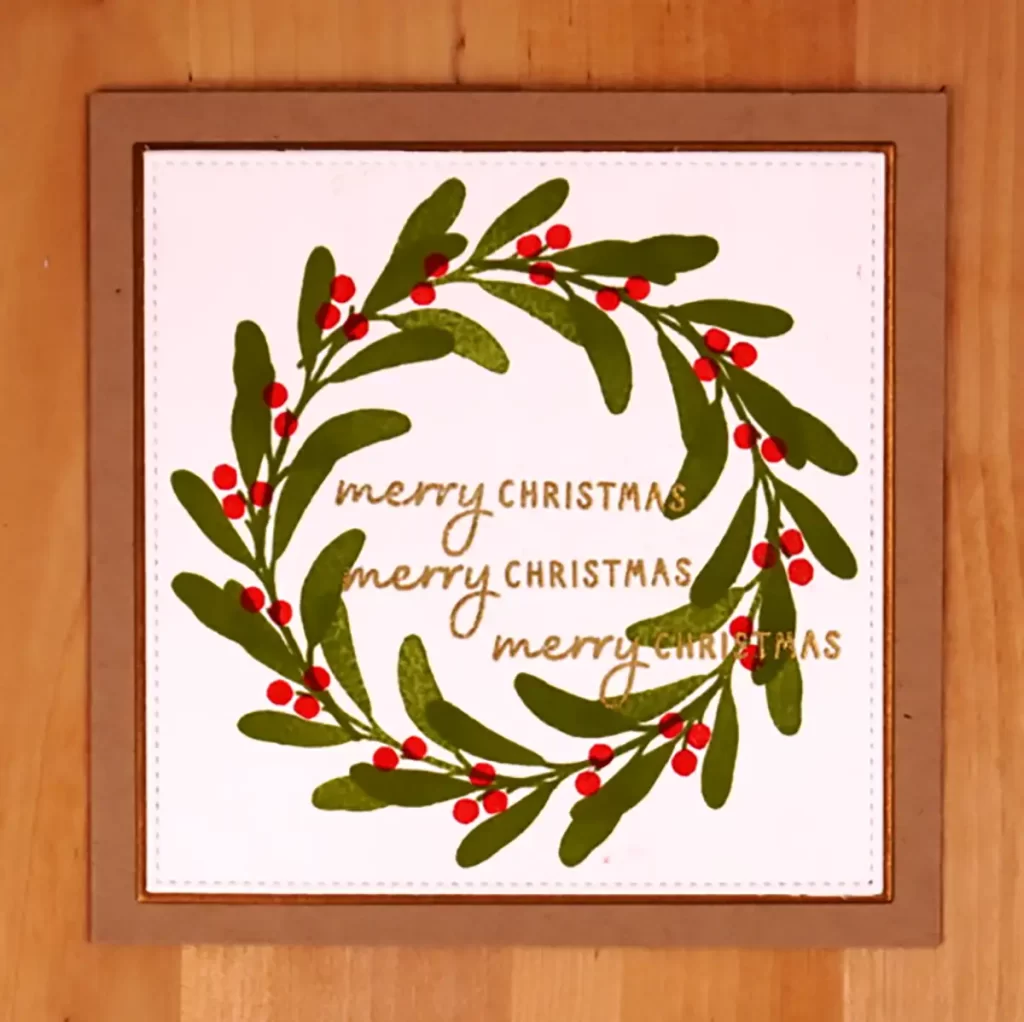 A holiday greeting card adorned with holly leaves and berries, celebrating the Countdown to Christmas.