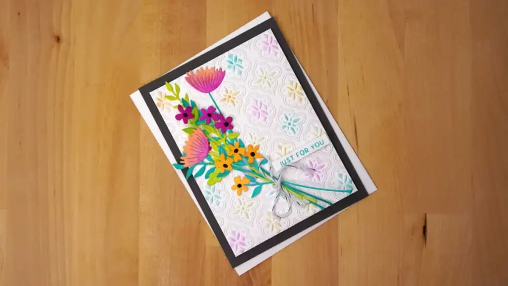 A Floral Reflections card featuring a bouquet of flowers.