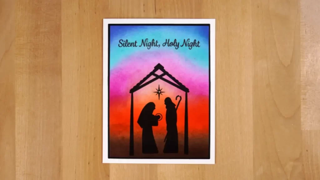 A Christmas card featuring a silhouette of two people in a nativity scene, as part of the Countdown to Christmas.
