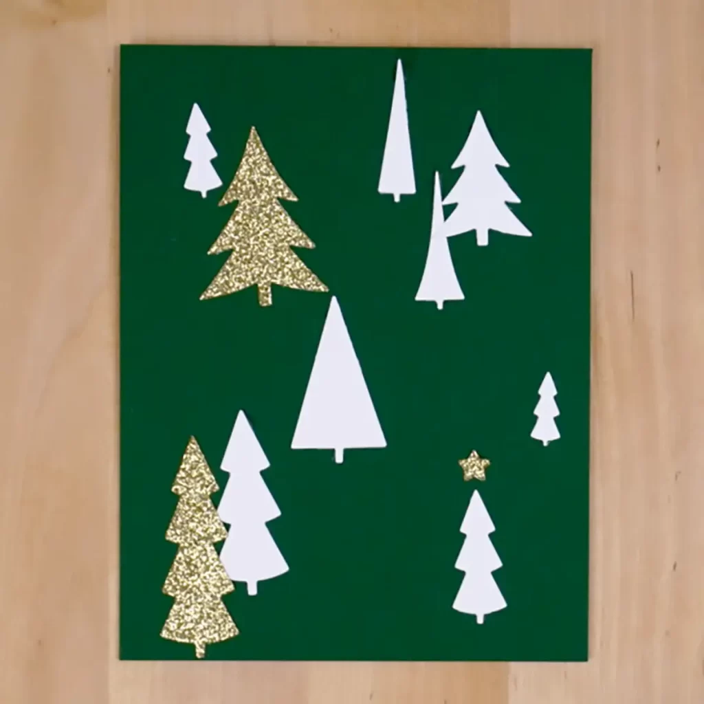 A festive green and gold Christmas card adorned with charming trees, capturing the anticipation of the countdown to Christmas.