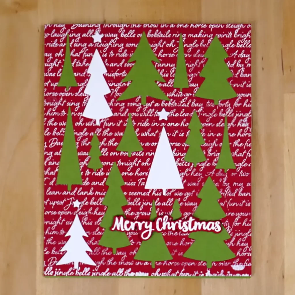 A festive Christmas card adorned with beautifully decorated trees.