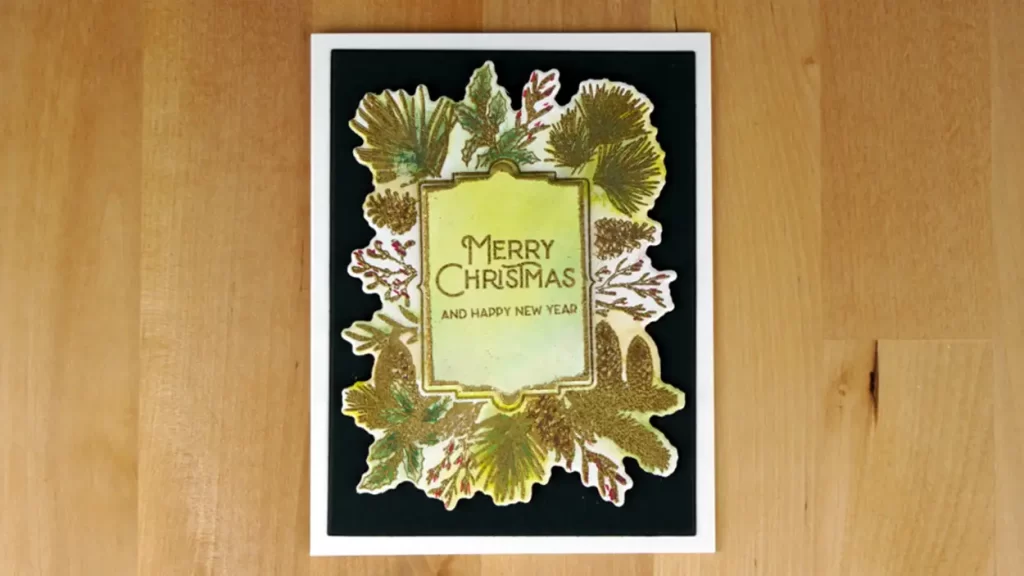 Merry christmas card with gold foil.
