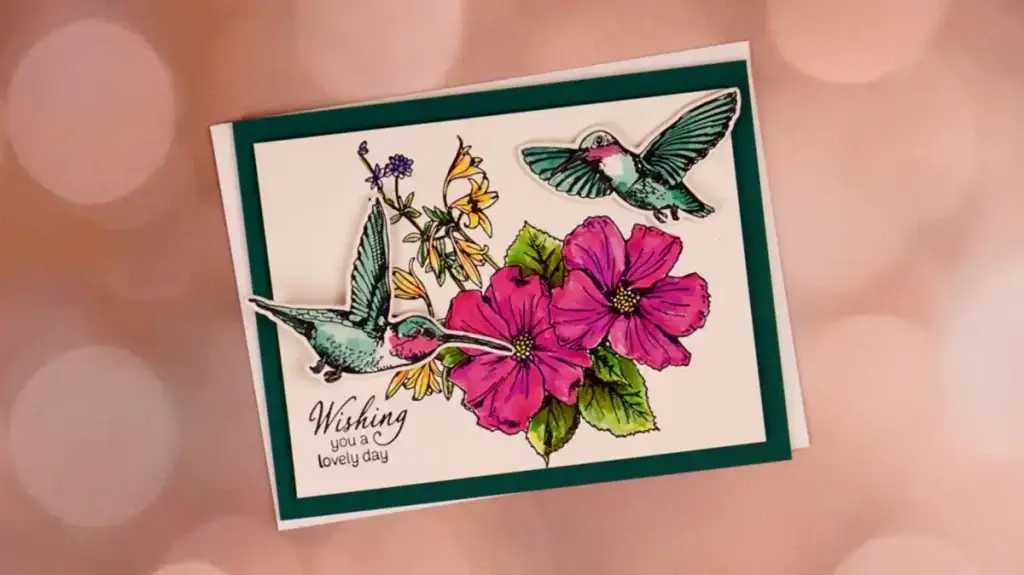 A card with hummingbirds and flowers made with Spellbinders' new 