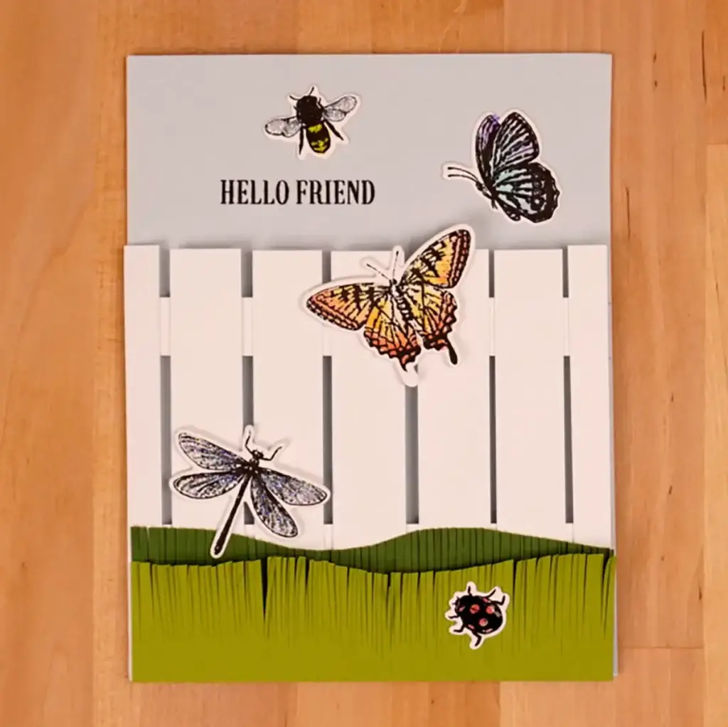 Hello friend greeting card with Beautiful Bloom butterflies and a fence.