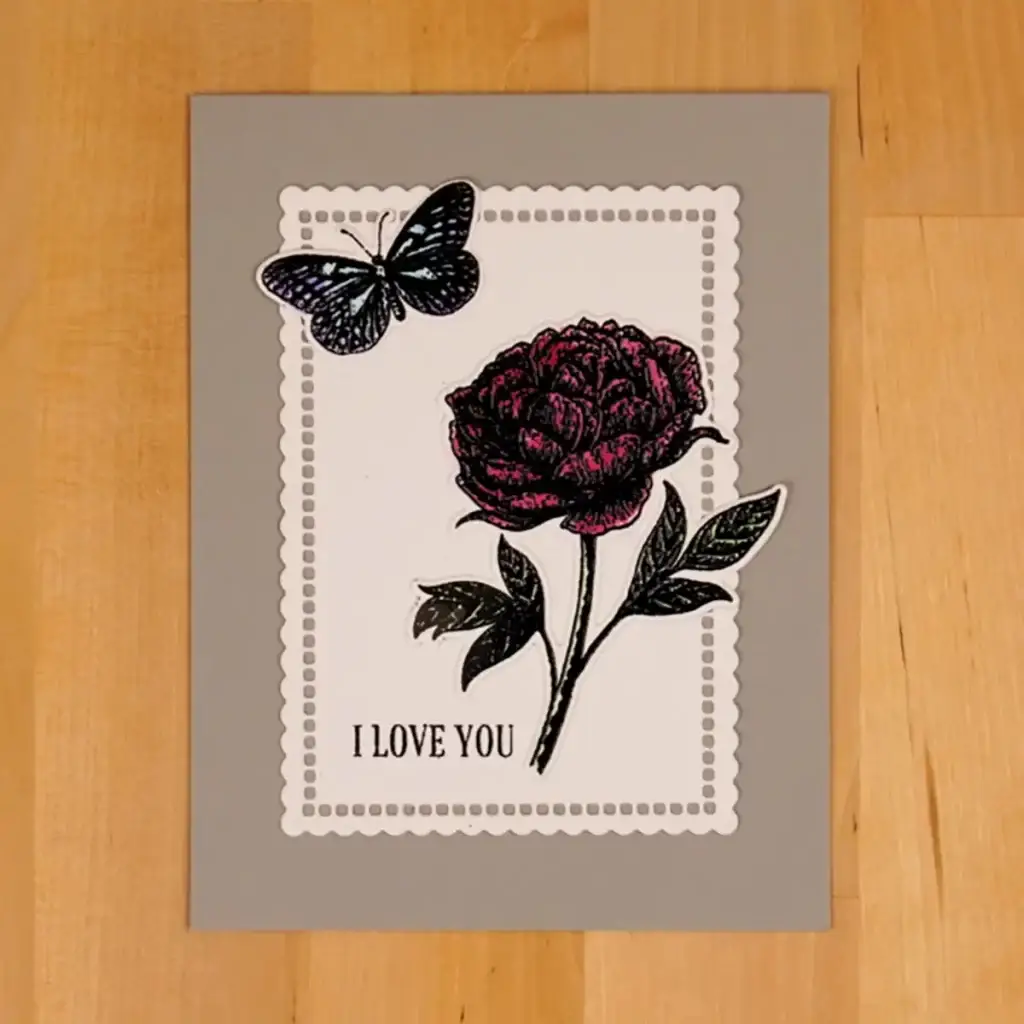 An I love you card with a Beautiful BlooIms butterfly and a flower.