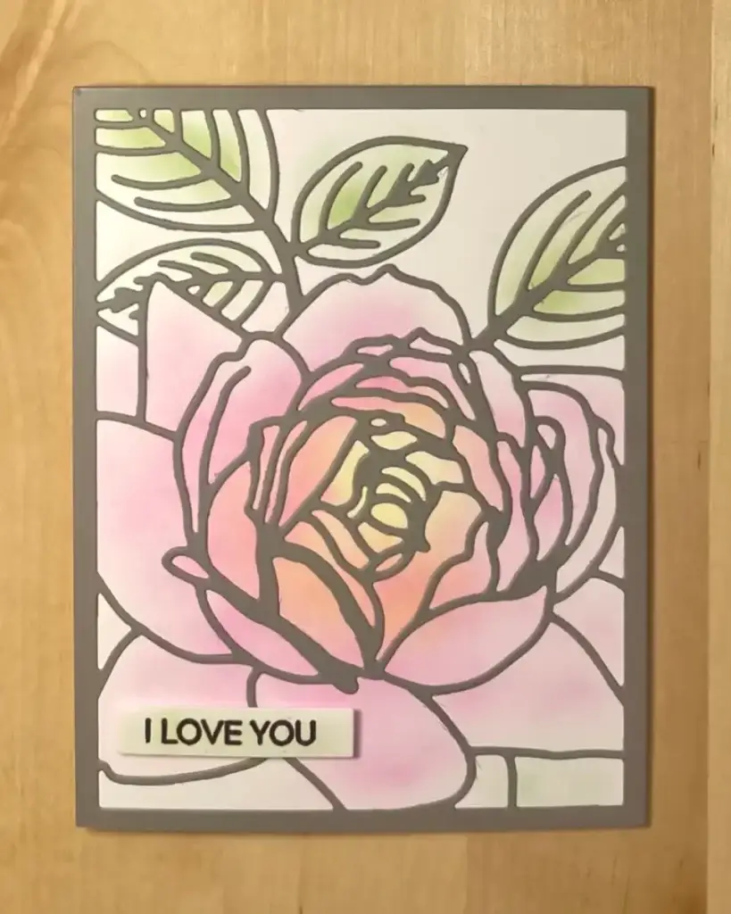 A Fantastic Floral card with a pink rose on it.