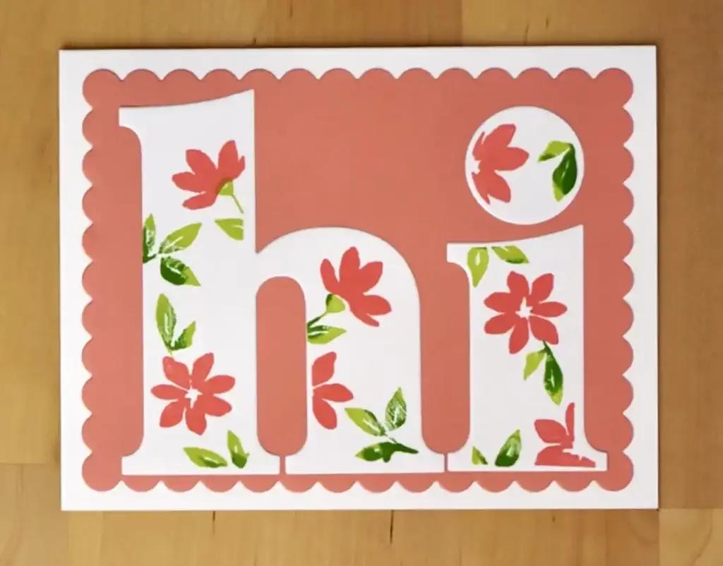 A hi card with flowers on it.