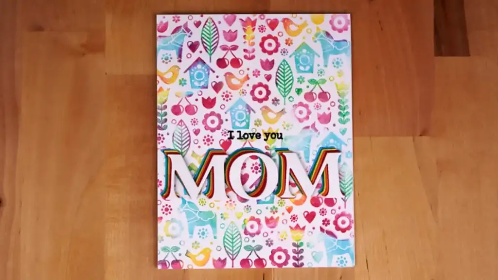 A colorful card with the word mom on it, perfect for Mother's Day.