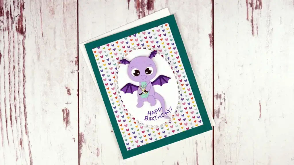 A purple card with a purple dragon on it, perfect for a Monster Birthday!