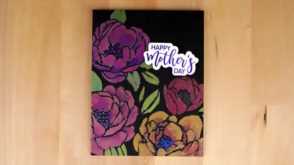 A black and purple Mother's Day card with flowers on it.